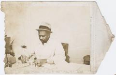 Charlie Graves in office of Uptown Club, circa 1954