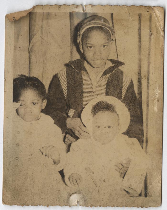 Children of Charlie Graves - from the left: Monica Graves-age 3, Brian Graves-age 10, Karen Graves age 11
months. Circa 1960