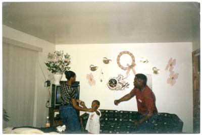 Darius Johnson with his cousin Tamika Johnson Hall at Barry Johnson's house in Big Woods, MD, 1999