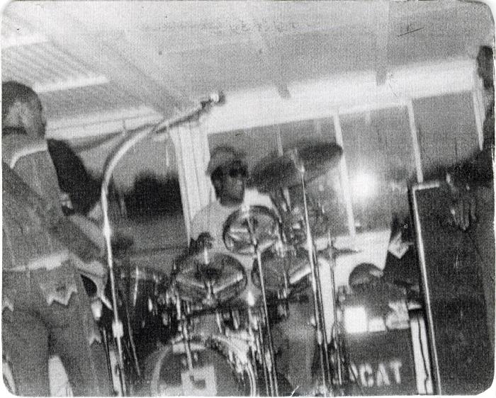 Photograph of Corey "Fat Cat" Hackett drummer and others in 1980