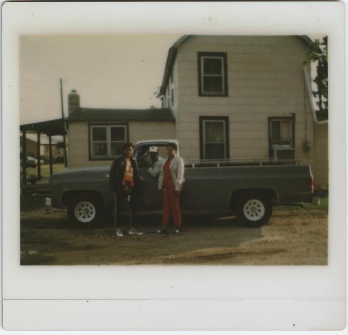 Denise Gillis, Barry Johnson seated in the truck, and wife Deborah Jones Johnson