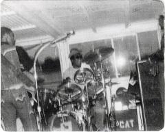 Photograph of Corey "Fat Cat" Hackett drummer and others in 1980