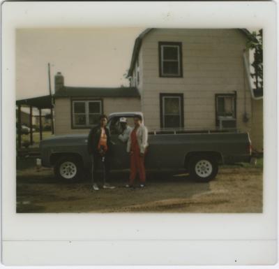 Denise Gillis, Barry Johnson seated in the truck, and wife Deborah Jones Johnson