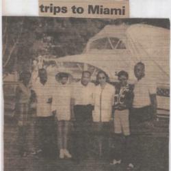 Scrapbook clipping of Dr. Martin Luther King, Jr. and friends at Virginia Beach, 1950s.