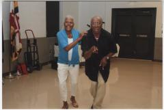 Hubert "Pie" and Jolly Phillips practice their dance moves for the upcoming Kennard Alumni event.