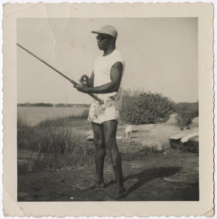 Man Sitting on Pier