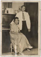 Couple Posing for Photo by Thalia Leduff in New York City