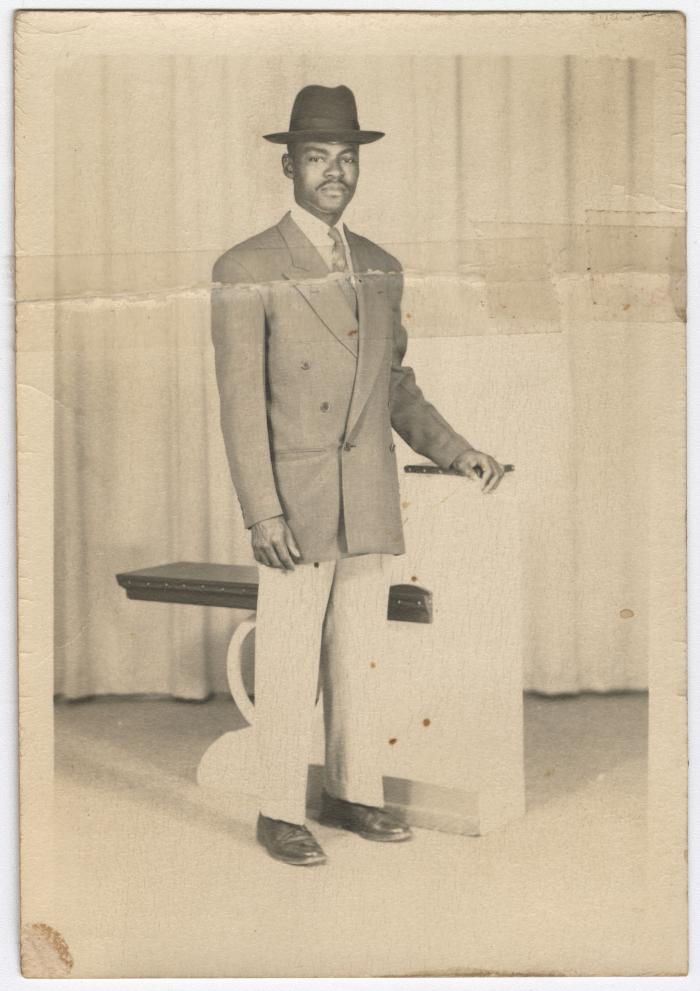 Man in a Hat Posing for a Photo