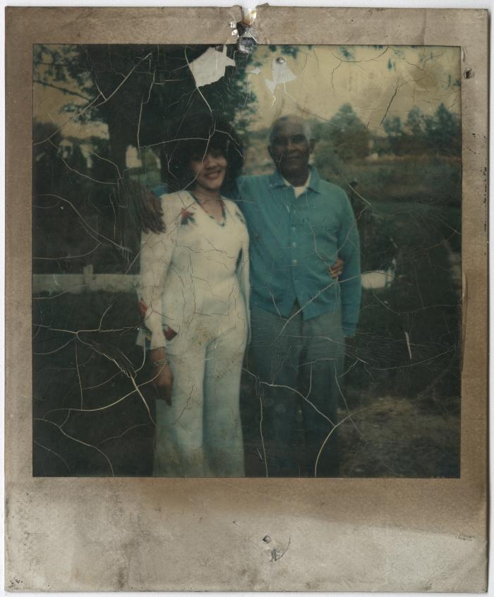 Man and Woman Taking a Photo Together Outside 
