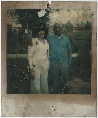 Man and Woman Taking a Photo Together Outside 