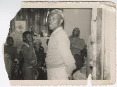 Black and White Photo of a Group of Men and Boys