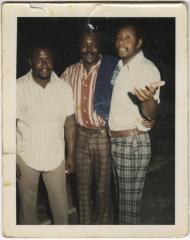 Trio of Men Smiling at the Camera