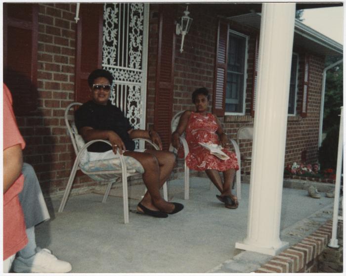 Shirley Jones and Others Sitting on a Porch