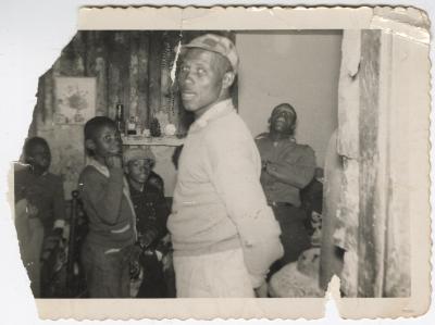 Black and White Photo of a Group of Men and Boys