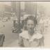 Black and White Photo of a Woman near a Street