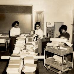 Mrs. Marie Brown, Home Economics Teacher, and students in a Kennard High School classroom
