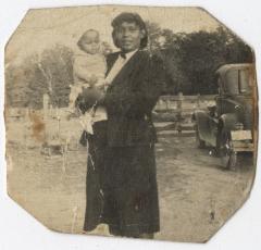 Black and White Photo of a Woman with a Baby