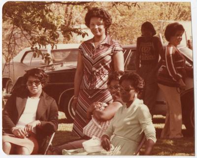 A Group of Women Sitting Outside
