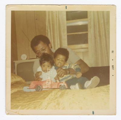 Dolson Anderson Jr. playing with his children