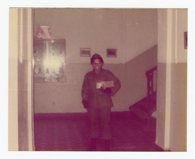 Eleanor Rochelle Ringgold holding a package