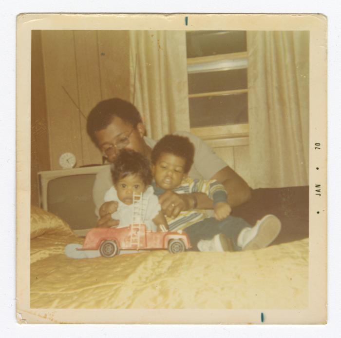 Dolson Anderson Jr. playing with his children
