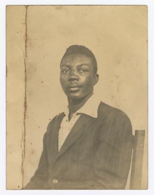 Clarence Hamilton seated