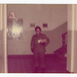 Eleanor Rochelle Ringgold holding a package