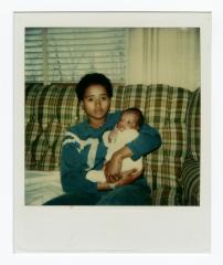 Eleanor Rochelle Ringgold holding a baby