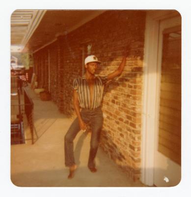 Man posing on wall on Fourth of July