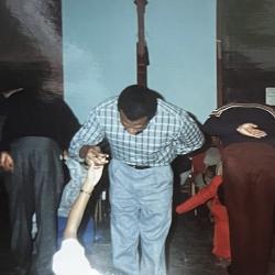 Debutante Escort practices his bow and his debutante's curtsy during dance practice session, 1989