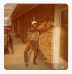 Man posing on wall on Fourth of July