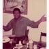 Corey "Fat Cat" Hackett seated at a table