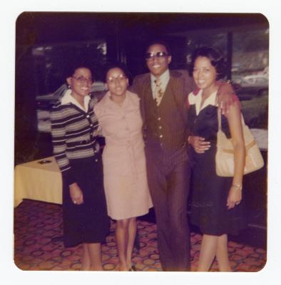 Sam Ringgold and sisters at broadcasting school graduation