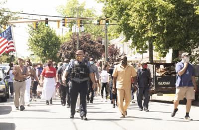 Marchers at the Remembering Anton, Time to Change the Narrative Protest